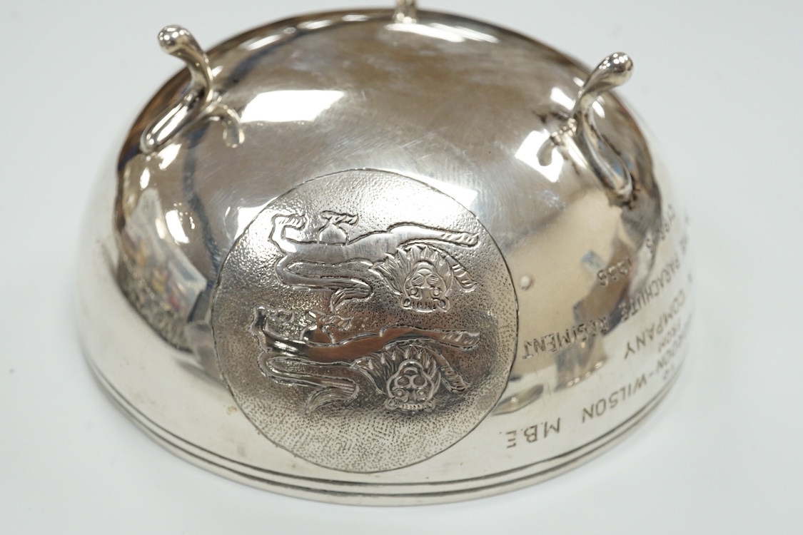 A late Victorian repousse silver navette shaped dish, by Charles Edwards, London, 1894, 25.7cm, with engraved monogram and date, together with a pair of mid 18th century silver sugar nips, an early 19th century silver vi